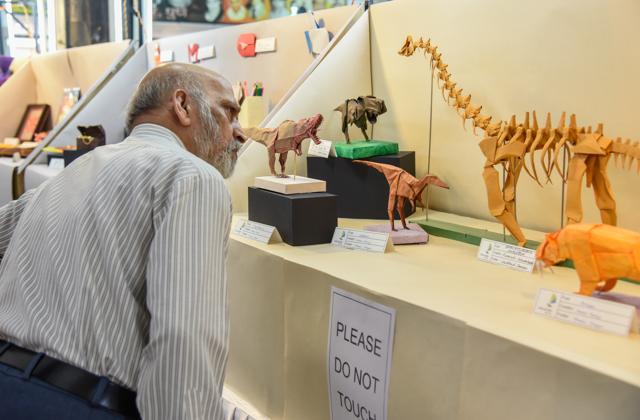 A man takes a close look at the origami work on display at the origami exhibition at Tilak Smarak Mandir. (Sanket Wankhade/HT PHOTO) A man takes a close look at the origami work on display at the origami exhibition at Tilak Smarak Mandir. (Sanket Wankhade/HT PHOTO)