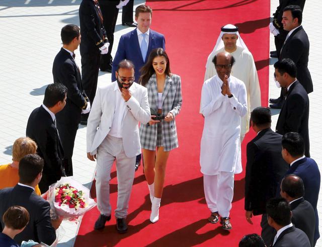 Tamil superstar Rajinikanth and Bollywood actress Amy Jackson arrive for the audio launch of upcoming flick 2.0, at a grand function in Dubai on Thursday. (PTI) Tamil superstar Rajinikanth and Bollywood actress Amy Jackson arrive for the audio launch of upcoming flick 2.0, at a grand function in Dubai on Thursday. (PTI)