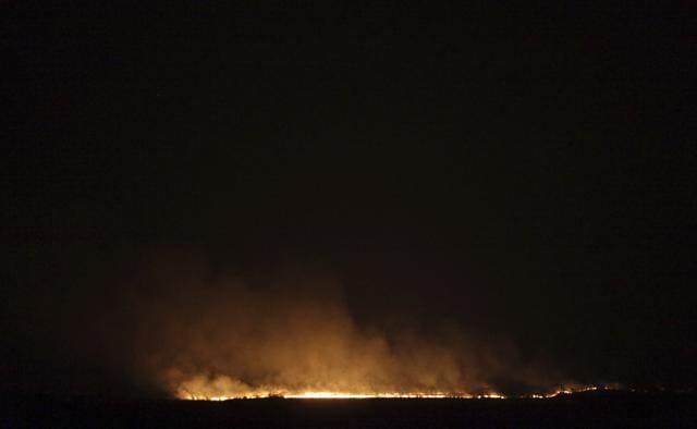 Wildfires burn in the Chapada dos Veadeiros National Park in Goias state, Brazil. (AP) Wildfires burn in the Chapada dos Veadeiros National Park in Goias state, Brazil. (AP)