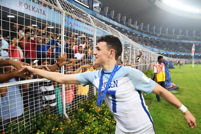England's midfielder Phil Foden greets spectators after their win over Spain. (AFP) England's midfielder Phil Foden greets spectators after their win over Spain. (AFP)