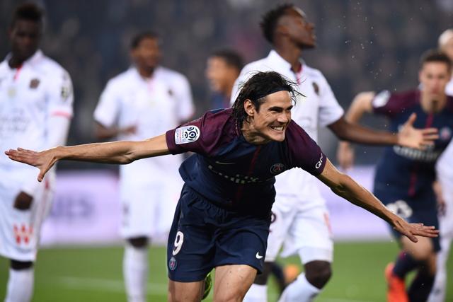 Paris Saint-Germain forward Edinson Cavani celebrates after scoring a goal against Nice. (AFP) Paris Saint-Germain forward Edinson Cavani celebrates after scoring a goal against Nice. (AFP)