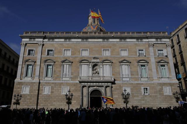An independence flag flutters outside the Palau Generalitat in Barcelona. (AP)