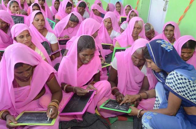Married women learning to write at Matri Gyan Kendra in Kota. (HT Photo) Married women learning to write at Matri Gyan Kendra in Kota. (HT Photo)