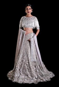 This beautifully embellished lehenga paired with a fringed blouse is equal parts drama and fun. (Jasjeet Plaha/HT Photo) This beautifully embellished lehenga paired with a fringed blouse is equal parts drama and fun. (Jasjeet Plaha/HT Photo)