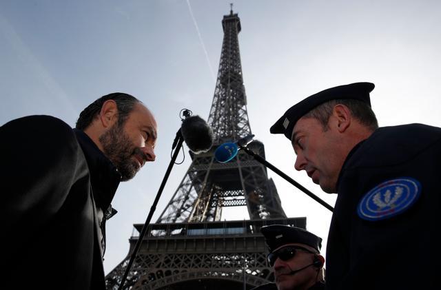 French Prime Minister Edouard Philippe (L) meets with police officers during a visit to the Eiffel Tower on November 1, 2017 in Paris, as France officially ended the state of emergency. (AFP) French Prime Minister Edouard Philippe (L) meets with police officers during a visit to the Eiffel Tower on November 1, 2017 in Paris, as France officially ended the state of emergency. (AFP)