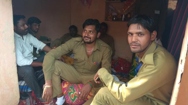 Safai karamcharis (in khaki) tasked with loading offerings in trucks. (HT Photo) Safai karamcharis (in khaki) tasked with loading offerings in trucks. (HT Photo)