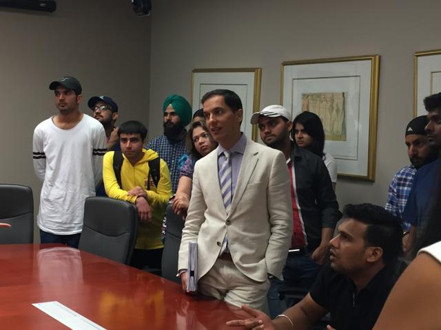 Immigration lawyer Ravi Jain (in white suit) at an immigration event at a college in Ontario. (Courtesy: Ravi Jain) Immigration lawyer Ravi Jain (in white suit) at an immigration event at a college in Ontario. (Courtesy: Ravi Jain)