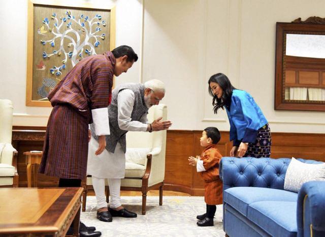 Bhutanese King Jigme Khesar Namgyel Wangchuck and Queen Jetsun Pema look on as Prime Minister, Narendra Modi interacts with their son Prince Jigme Namgyel Wangchuck during a meeting in New Delhi on Wednesday. (PTI) Bhutanese King Jigme Khesar Namgyel Wangchuck and Queen Jetsun Pema look on as Prime Minister, Narendra Modi interacts with their son Prince Jigme Namgyel Wangchuck during a meeting in New Delhi on Wednesday. (PTI)