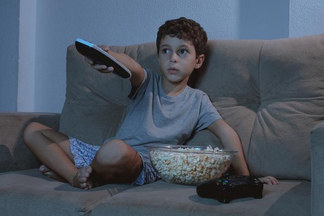 Do not allow unlimited access to media. Place a time limit on how often or long a child is allowed to use an electronic device, including games and television. (Shutterstock) Do not allow unlimited access to media. Place a time limit on how often or long a child is allowed to use an electronic device, including games and television. (Shutterstock)