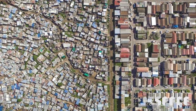 Renowned photographer and filmmaker Johnny Miller of South Africa will bring his acclaimed Unequal Scenes aerial documentary project of inequality to Goa, where he will use drone photography to capture stark juxtapositions between poverty and affluence. Renowned photographer and filmmaker Johnny Miller of South Africa will bring his acclaimed Unequal Scenes aerial documentary project of inequality to Goa, where he will use drone photography to capture stark juxtapositions between poverty and affluence.