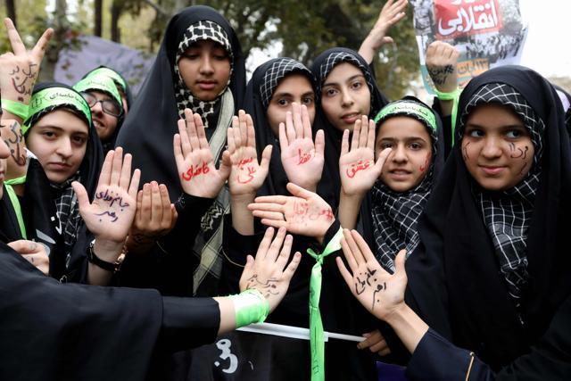 Iranian women take part in a demonstration outside the former US embassy in the Iranian capital Tehran on November 4, 2017. (AFP) Iranian women take part in a demonstration outside the former US embassy in the Iranian capital Tehran on November 4, 2017. (AFP)