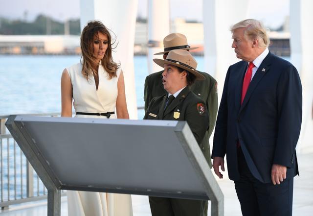 US President Donald Trump and First Lady Melania Trump visit the USS Arizona Memorial. (AFP) US President Donald Trump and First Lady Melania Trump visit the USS Arizona Memorial. (AFP)