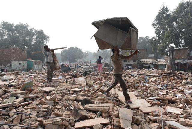 Their houses were razed to the ground in a Their houses were razed to the ground in a