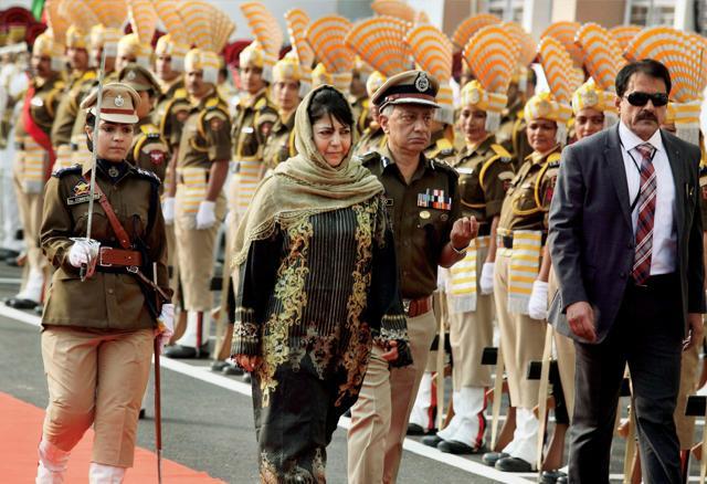 Jammu and Kashmir chief minister Mehbooba Mufti inspects a guard of honour on the first day of the re-opening of the civil secretariat following the annual 'Darbar Move' in Jammu on Monday. (PTI) Jammu and Kashmir chief minister Mehbooba Mufti inspects a guard of honour on the first day of the re-opening of the civil secretariat following the annual 'Darbar Move' in Jammu on Monday. (PTI)