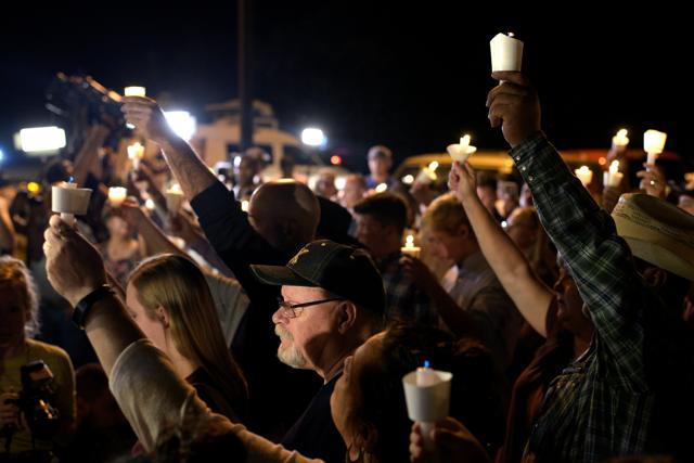 Mourners attend a candle light vigil after a mass shooting at the First Baptist Church in Sutherland Springs, Texas. (Reuters Photo) Mourners attend a candle light vigil after a mass shooting at the First Baptist Church in Sutherland Springs, Texas. (Reuters Photo)