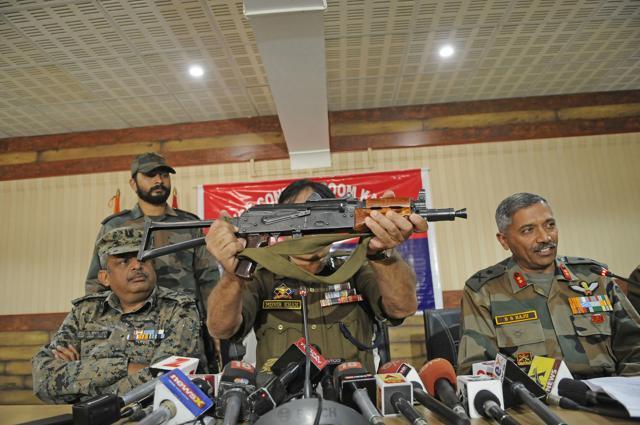 Inspector general of police (IGP), Kashmir range, Muneer Khan displays the AK47 Draco rifle during a press conference with Army and CRPF in Srinagar on Tuesday. (Waseem Andrabi/HT) Inspector general of police (IGP), Kashmir range, Muneer Khan displays the AK47 Draco rifle during a press conference with Army and CRPF in Srinagar on Tuesday. (Waseem Andrabi/HT)