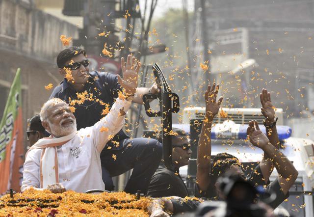 Prime Minister Narendra Modi campaigns for the BJP in Varanasi on March 4, 2017 in the UP elections. The BJP’s victory in UP helped Modi’s image after his demonetisation decision. (Arun Sharma/HT Photo)