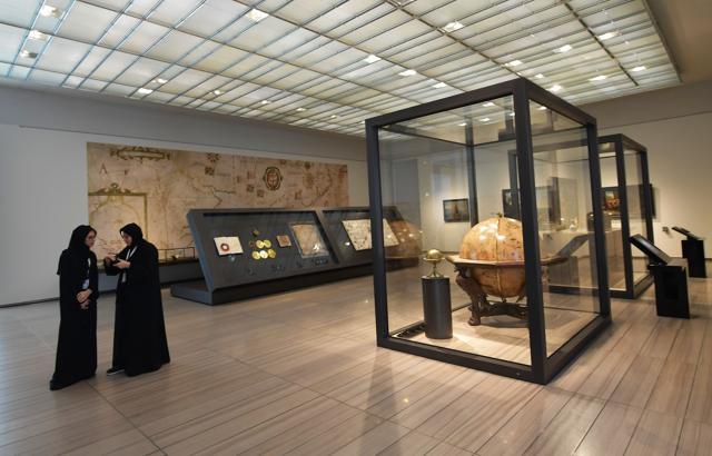 Women visit a room at the Louvre Abu Dhabi Museum during a media tour. (AFP) Women visit a room at the Louvre Abu Dhabi Museum during a media tour. (AFP)