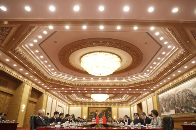 US President Donald Trump, seventh from right, and Chinese President Xi Jinping, eighth from left, attend a bilateral meeting at the Great Hall of the People in Beijing on Nov 9. (AP Photo) US President Donald Trump, seventh from right, and Chinese President Xi Jinping, eighth from left, attend a bilateral meeting at the Great Hall of the People in Beijing on Nov 9. (AP Photo)