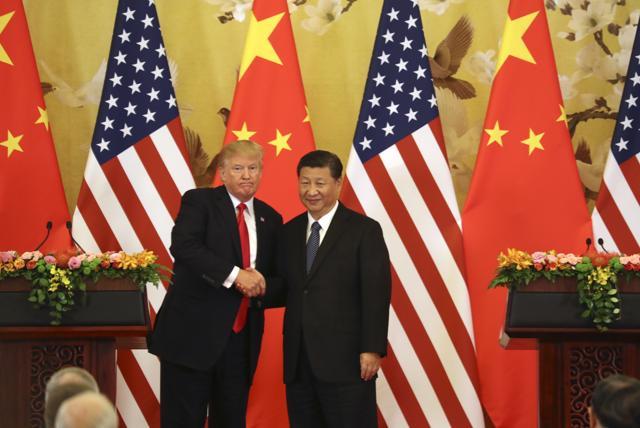 US President Donald Trump and Chinese President Xi Jinping shakes hands during a joint press conference at the Great Hall of the People on Nov 9. (AP Photo) US President Donald Trump and Chinese President Xi Jinping shakes hands during a joint press conference at the Great Hall of the People on Nov 9. (AP Photo)