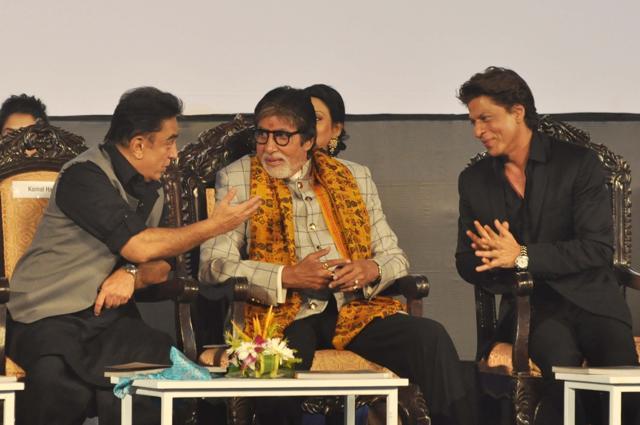 Actors Amitabh Bachchan, Kamal Haasan and Shah Rukh Khan talk during the inauguration of the 23rd Kolkata International Film Festival in Kolkata. (IANS)