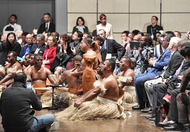 Native people from Fiji sit between delegates during the opening of the COP 23 Fiji UN Climate Change Conference in Bonn. (AP Photo) Native people from Fiji sit between delegates during the opening of the COP 23 Fiji UN Climate Change Conference in Bonn. (AP Photo)
