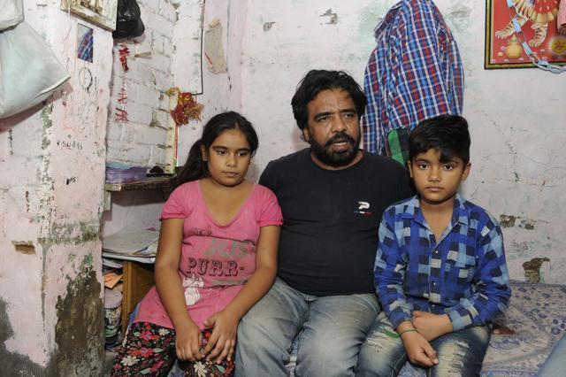 With daughters Sukhdeep (left) and Hardeep, Lal Chand talks about wife Sonia who has pleaded to be brought back from Saudi Arabia, in Atti village near Goraya in Jalandhar. (Keshav Singh/HT ) With daughters Sukhdeep (left) and Hardeep, Lal Chand talks about wife Sonia who has pleaded to be brought back from Saudi Arabia, in Atti village near Goraya in Jalandhar. (Keshav Singh/HT )