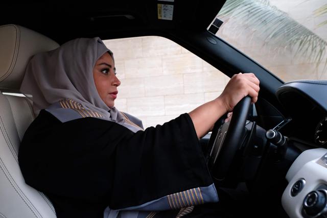 A Saudi woman drives her car in Jeddah on September 27, 2017. Saudi Arabia will allow women to drive from next June, state media said. (AFP)
