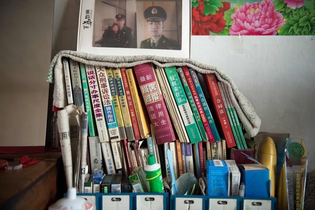 Books are stacked inside the room of farmer Wang Enlin in his house in Yushutun. (AFP Photo) Books are stacked inside the room of farmer Wang Enlin in his house in Yushutun. (AFP Photo)