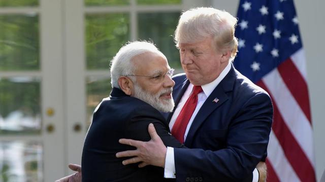 President Donald Trump and Indian Prime Minister Narendra Modi hug while making statements in the Rose Garden of the White House in Washington. (AP) President Donald Trump and Indian Prime Minister Narendra Modi hug while making statements in the Rose Garden of the White House in Washington. (AP)
