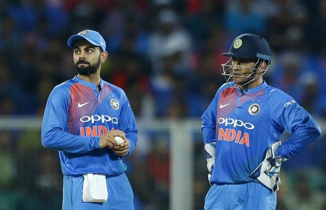 India’s captain Virat Kohli with teammate Mahendra Singh Dhoni. India’s captain Virat Kohli with teammate Mahendra Singh Dhoni.