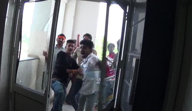 In Kota, an eyewitness said that the activists first vandalized the booking window of the Gold Cinema on the ground floor and broke a glass window. (HT Photo) In Kota, an eyewitness said that the activists first vandalized the booking window of the Gold Cinema on the ground floor and broke a glass window. (HT Photo)