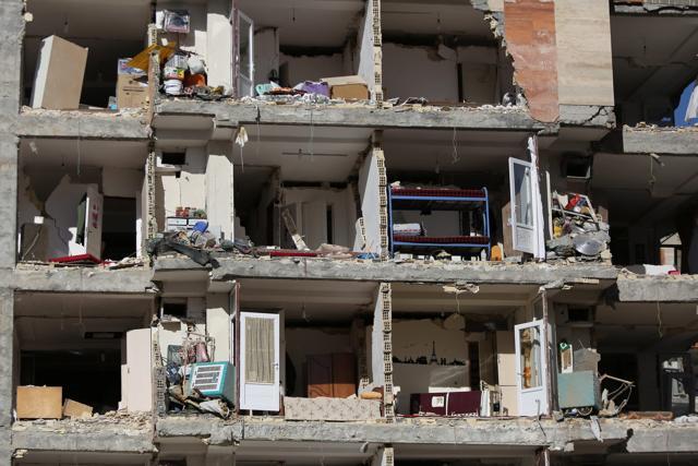 A damaged building is seen following an earthquake in Sarpol-e Zahab county in Kermanshah, Iran . (REUTERS) A damaged building is seen following an earthquake in Sarpol-e Zahab county in Kermanshah, Iran . (REUTERS)