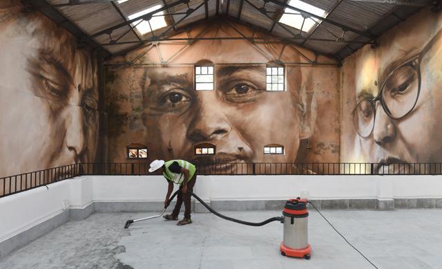 A photo mural at Sassoon Dock. (AFP) A photo mural at Sassoon Dock. (AFP)