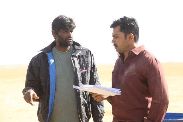 Deep in discussion: Director Vinoth with actor Karthi.