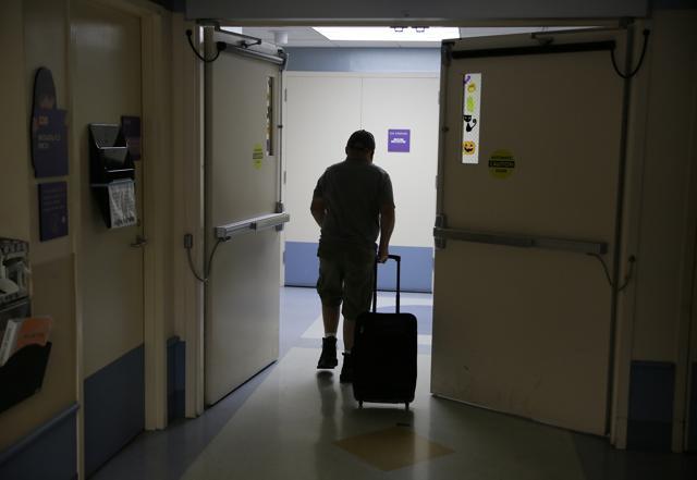 Brian Madeux, 44, makes his way through the UCSF Benioff Children's Hospital for the first human gene editing therapy for NPS, in Oakland. (AP Photo) Brian Madeux, 44, makes his way through the UCSF Benioff Children's Hospital for the first human gene editing therapy for NPS, in Oakland. (AP Photo)