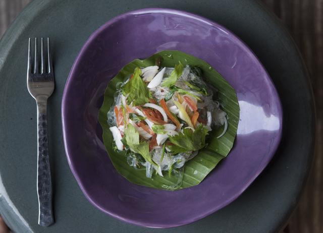 As you tuck into the herb-laden spicy vermicelli salad, tossed with plump, juicy prawns, the pungency builds. But even as your eyes water and nose runs, you don’t want to waste a morsel. (Aalok Soni / HT Photo)