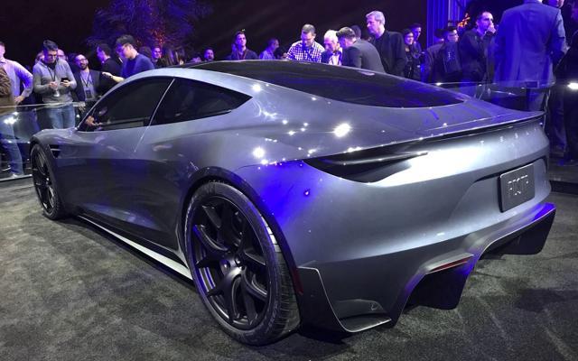 Tesla rolls out a surprise with big-rig truck: New and faster Roadster for $200,000