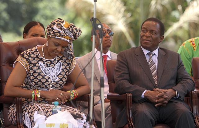 Zimbabwean first lady Grace Mugabe, left, sits next to vice President Emmerson Mnangagwa at the Zanu pf headquarters in Harare. (AP File Photo) Zimbabwean first lady Grace Mugabe, left, sits next to vice President Emmerson Mnangagwa at the Zanu pf headquarters in Harare. (AP File Photo)