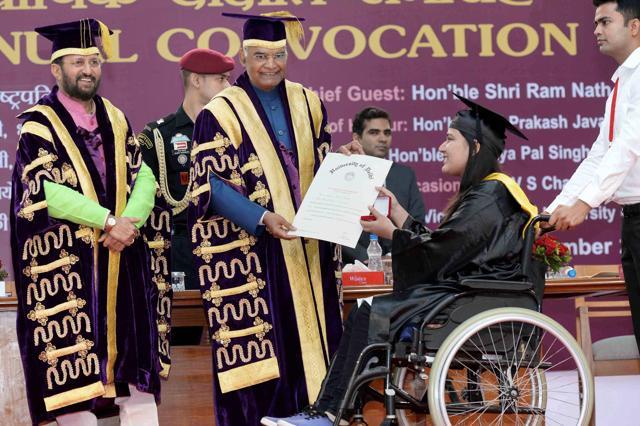 President Ram Nath Kovind presents a degree to a student at the DU convocation. (PTI) President Ram Nath Kovind presents a degree to a student at the DU convocation. (PTI)