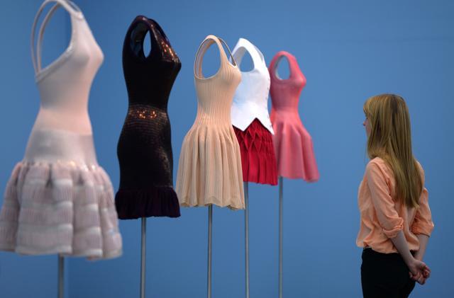 A visitor looks at fashion designed by Azzedine Alaia at the Museum NRW-Forum in Duesseldorf, western Germany. (AFP Files)