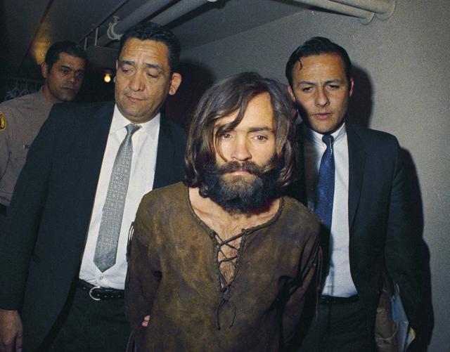 Charles Manson is escorted to his arraignment on conspiracy-murder charges in connection with the Sharon Tate murder case. (AP File Photo) Charles Manson is escorted to his arraignment on conspiracy-murder charges in connection with the Sharon Tate murder case. (AP File Photo)