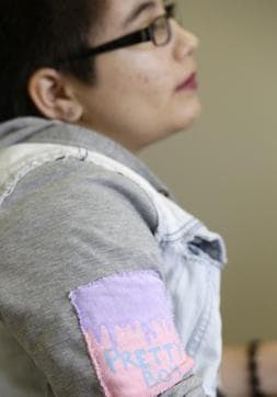 Theo Ramos wears a patch which reads, "Pretty Boy" as he waits for an evaluation by an endocrinologist in Miami. (AP) Theo Ramos wears a patch which reads, "Pretty Boy" as he waits for an evaluation by an endocrinologist in Miami. (AP)