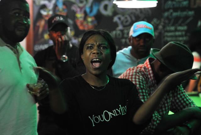 Zimbabweans react as they watch a television broadcasting an address by President Robert Mugabe at Harare Sports Club in Harare on November 19, 2017, following a meeting with army chiefs who have seized power in Zimbabwe. (AFP) Zimbabweans react as they watch a television broadcasting an address by President Robert Mugabe at Harare Sports Club in Harare on November 19, 2017, following a meeting with army chiefs who have seized power in Zimbabwe. (AFP)
