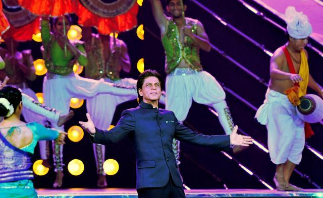 Bollywood shin in Goa: Shah Rukh Khan does his signature step at IFFI 2017 inaugural. (PTI) Bollywood shin in Goa: Shah Rukh Khan does his signature step at IFFI 2017 inaugural. (PTI)