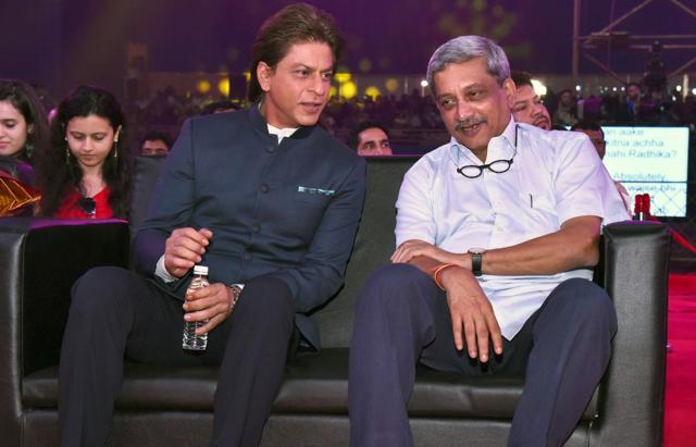 Goa chief minister Manohar Parrikar and Shah Rukh Khan interact during the opening ceremony of 48th edition of IFFI 2017 at the Dr Shyama Prasad Mukherjee stadium in Bambolim, near Panaji, Goa on Monday. (IANS) Goa chief minister Manohar Parrikar and Shah Rukh Khan interact during the opening ceremony of 48th edition of IFFI 2017 at the Dr Shyama Prasad Mukherjee stadium in Bambolim, near Panaji, Goa on Monday. (IANS)