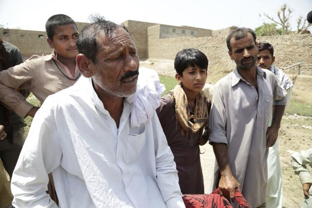 In this picture taken on May 5, 2017, Rana Mohammad Jamal talks about an alleged rape attempt on a girl by mullah in Kehror Pakka, Pakistan. He said, "This is a genuine case but the family took money to not speak about it." His voice and the voices of those who had gathered outside the girl's home grew softer as they spoke about the nearby madrassa, which they said was not registered. (AP) In this picture taken on May 5, 2017, Rana Mohammad Jamal talks about an alleged rape attempt on a girl by mullah in Kehror Pakka, Pakistan. He said, "This is a genuine case but the family took money to not speak about it." His voice and the voices of those who had gathered outside the girl's home grew softer as they spoke about the nearby madrassa, which they said was not registered. (AP)