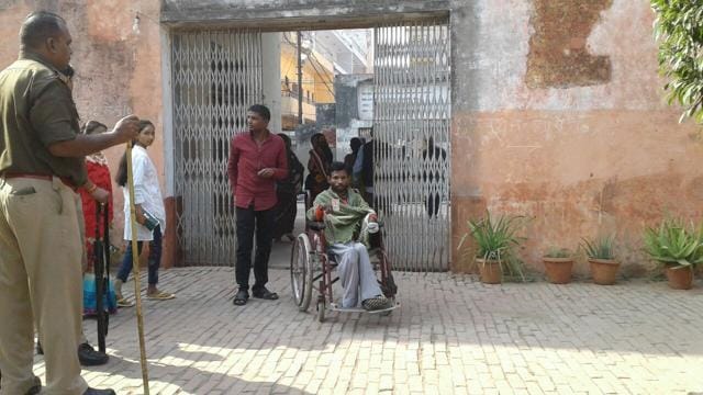 A disabled man casts his vote in Raipura. (HT) A disabled man casts his vote in Raipura. (HT)
