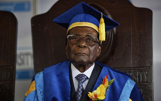 Former Zimbabwean president Robert Mugabe attends a graduation ceremony on the outskirts of Harare. (AP File Photo) Former Zimbabwean president Robert Mugabe attends a graduation ceremony on the outskirts of Harare. (AP File Photo)