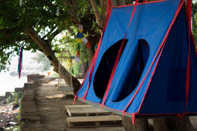 Travel enthusiasts can choose from tents on the ground, suspended from trees (above) or floating on water. Travel enthusiasts can choose from tents on the ground, suspended from trees (above) or floating on water.